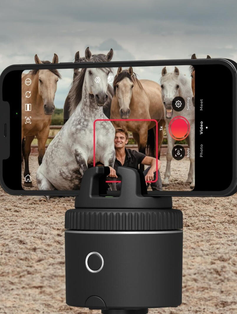 A smart phone holder that automatically tracks movement for hands-free video recording. Great for equestrians and content creators.
