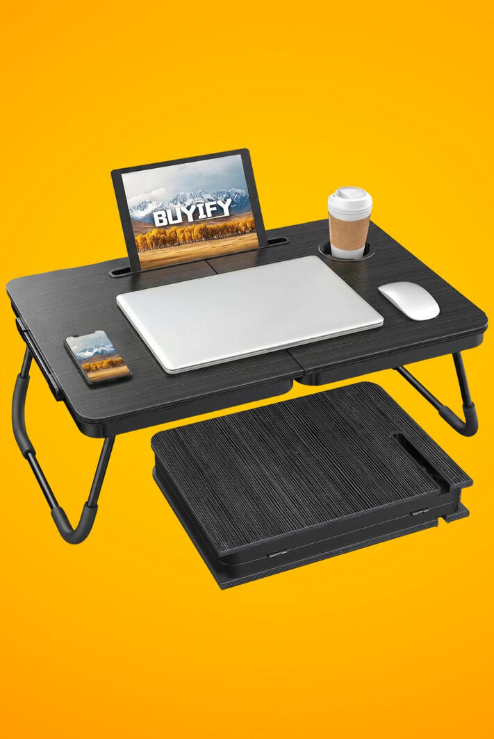Your couch just became your most productive spot in the house This spacious, foldable lap desk is the ultimate couch companion for working, studying, eating, or streaming. Features a built-in cup holder and tablet slot, requires no assembly, and folds flat for easy storage under the bed or beside the sofa. Lightweigh